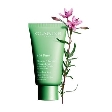 The Clarins SOS Pure Rebalancing Clay Mask Bottle featured alongside a flower.