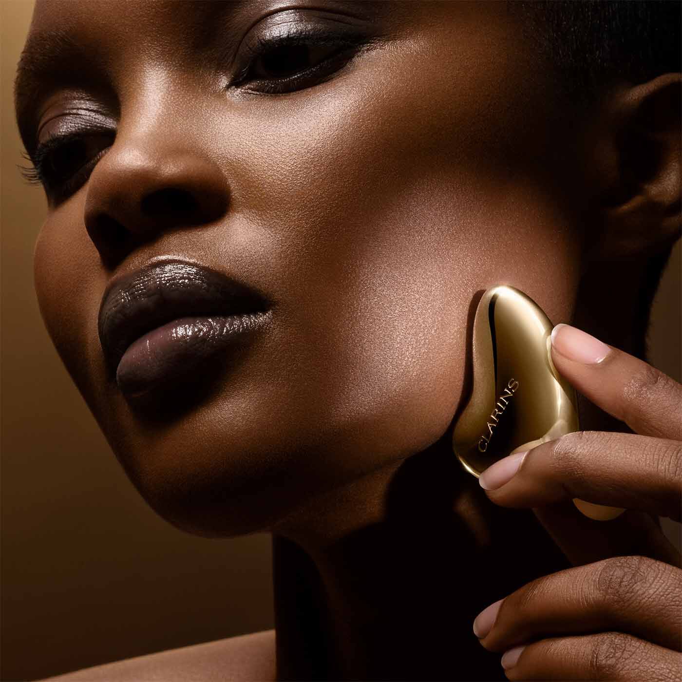 Precious L'Outil 3-in-1 Facial Massage Tool | CLARINS®