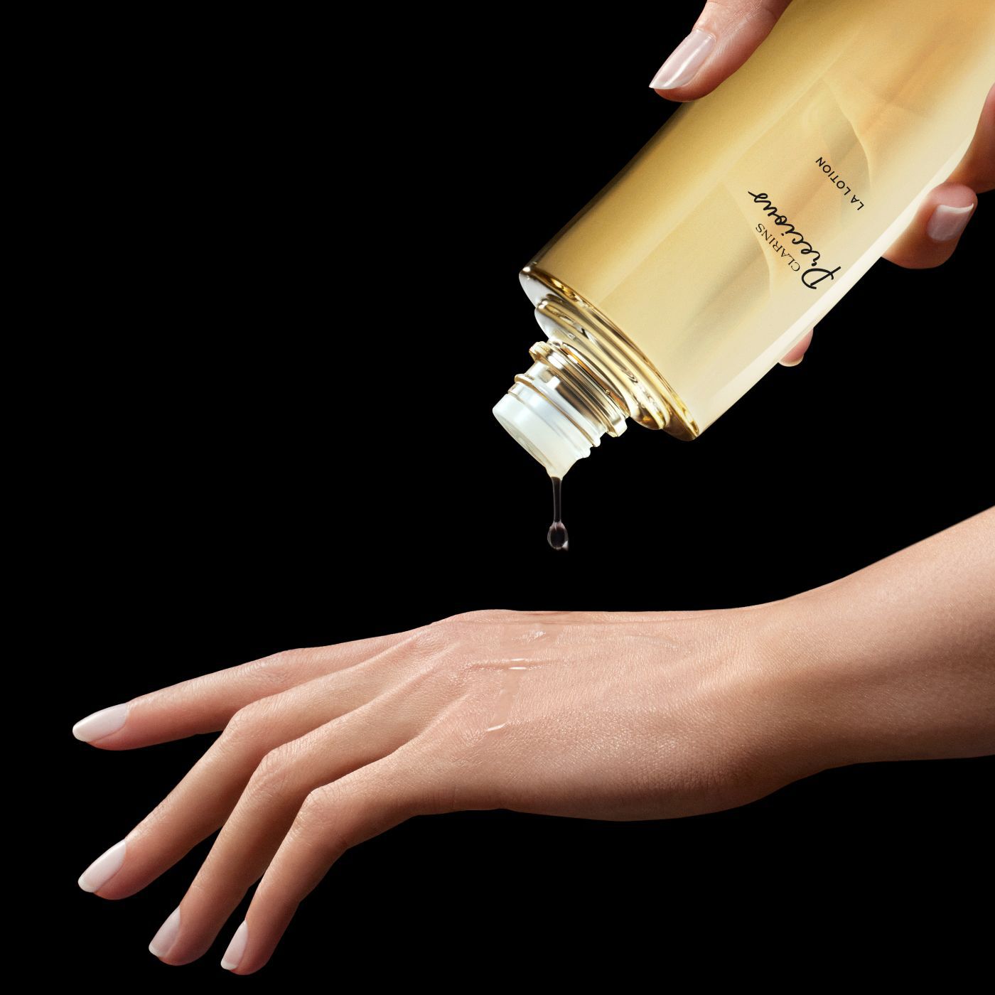 Precious La Lotion Age-Defying Treatment Essence | CLARINS®