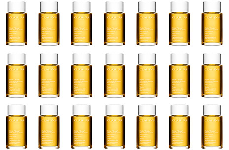 Bottles of Tonic Body Treatment Oil