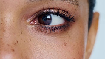 Close-up of a woman with brown eyes. Close-up of a woman with brown eyes.